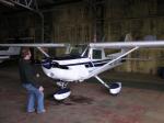 Conor pulling Cessna 152 from hangar 